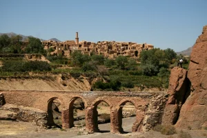 Sassanid Bridge with the Village of Kharanaq in the Background